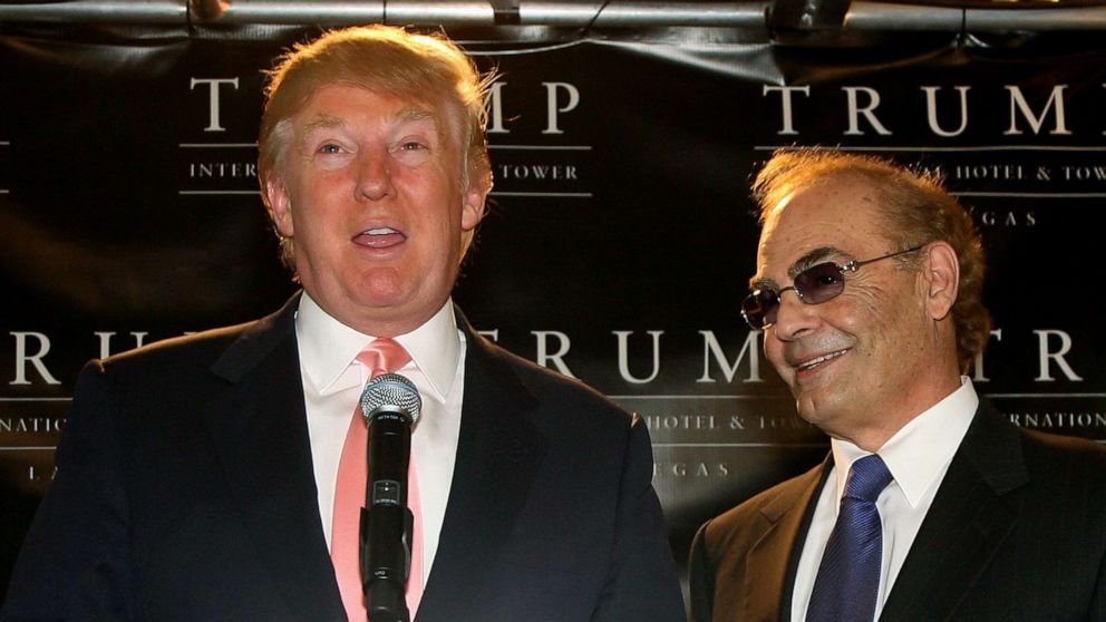PHOTO: Donald Trump, left, and his partner, developer Phil Ruffin, speak during an opening ceremony for the Trump International Hotel & Tower Las Vegas, April 11, 2008, in Las Vegas, Nevada.