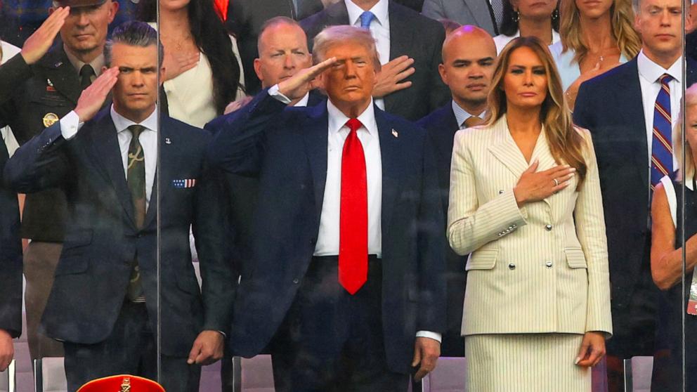 PHOTO: President Donald Trump, Secretary of Defense Pete Hegseth and first lady Melania Trump watch the U.S. Army's 250th Birthday parade, on the same day of President Donald Trump 79th birthday, in Washington, D.C., June 14, 2025. 
