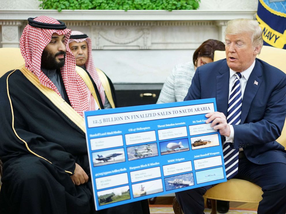 PHOTO: In this file photo, President Donald Trump holds a defense sales chart with Saudi Arabias Crown Prince Mohammed bin Salman in the Oval Office of the White House on March 20, 2018, in Washington.