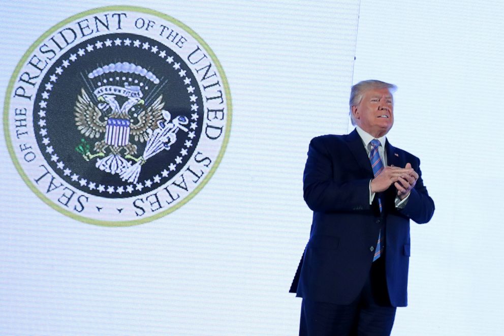 PHOTO: U.S. President Donald Trump takes the stage next to an altered presidential seal prior to a speech at Turning Point USA's Teen Student Action Summit in Washington, July 23, 2019.