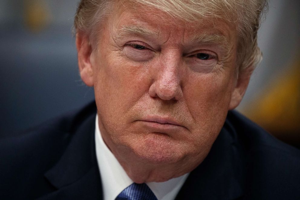 PHOTO: President Donald Trump listens during a  meeting in the Roosevelt Room of the White House, June 21, 2018, in Washington, D.C.