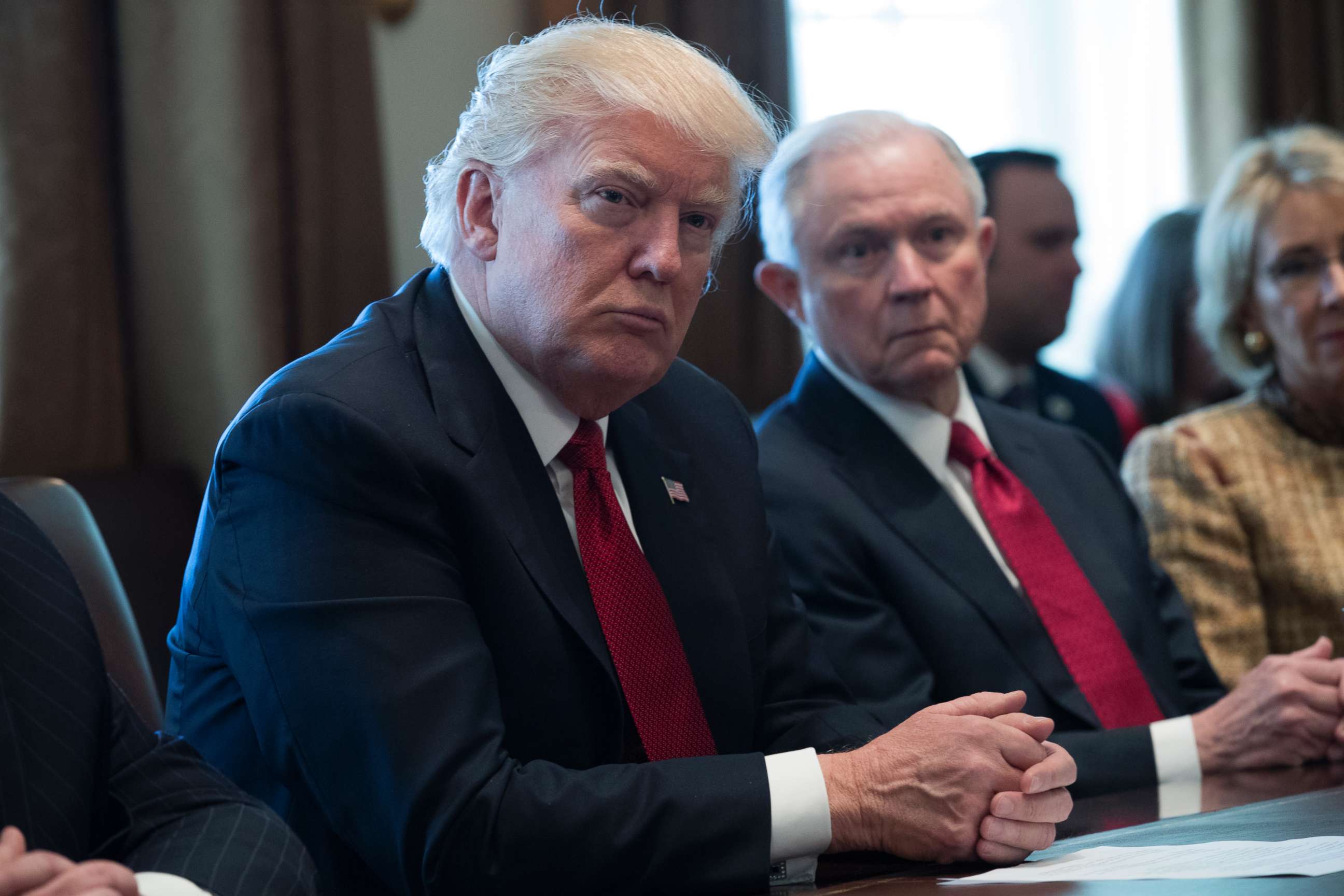 PHOTO: President Donald Trump and Attorney General Jeff Sessions attend a panel discussion on opioid and drug abuse in the Roosevelt Room of the White House, March 29, 2017. 