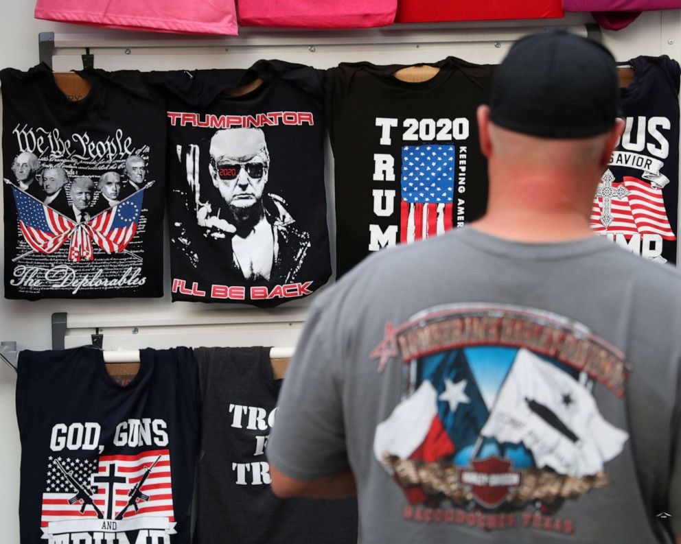 PHOTO: A man looks at T-shirts a day before President Donald Trump holds a rally, near the BOK Center in Tulsa, Okla., June 19, 2020.