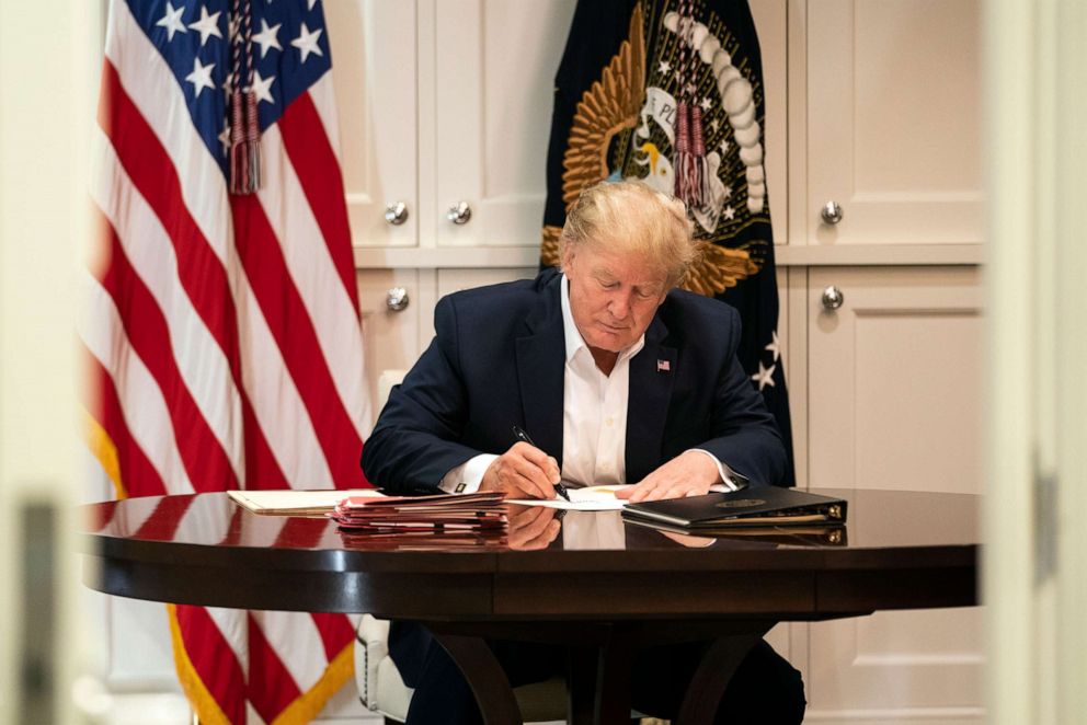 PHOTO: In this image released by the White House, President Donald Trump works in the Presidential Suite at Walter Reed National Military Medical Center in Bethesda, Md. Saturday, Oct. 3, 2020, after testing positive for COVID-19.