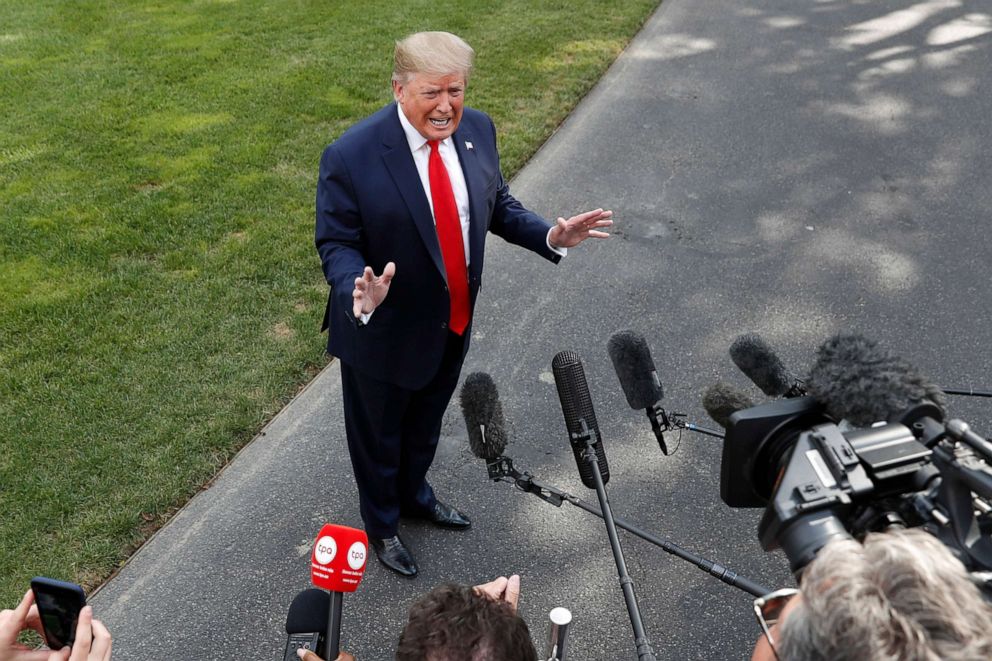 PHOTO: President Donald Trump speaks to the media about the testimony of White House Special Counsel Robert Mueller to Congress, July 24, 2019, outside the White House.