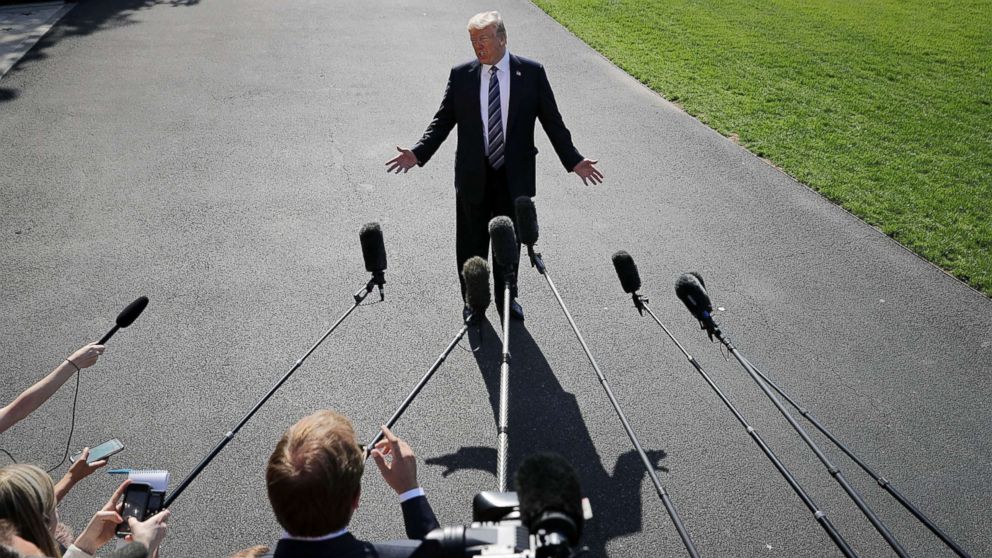 PHOTO: President Donald Trump talks to members of the news media before departing the White House, May 25, 2018 in Washington, D.C.
