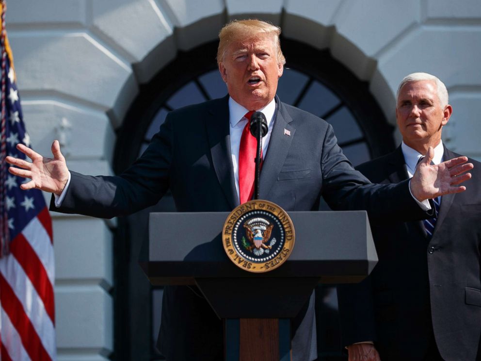PHOTO: President Donald Trump delivers remarks about the economy on the South Lawn of the White House with Vice President Mike Pence, July 27, 2018.