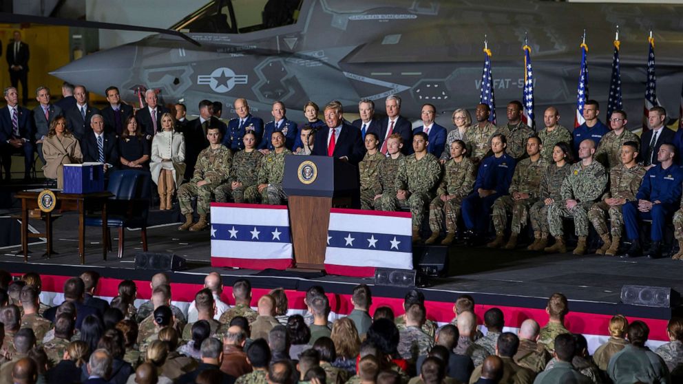 PHOTO: President Donald J. Trump speaks on stage during the signing ceremony for the National Defense Authorization Act for Fiscal Year 2020 inside Hangar Six at Joint Base Andrews in Suitland, M.D., Dec. 20, 2019.