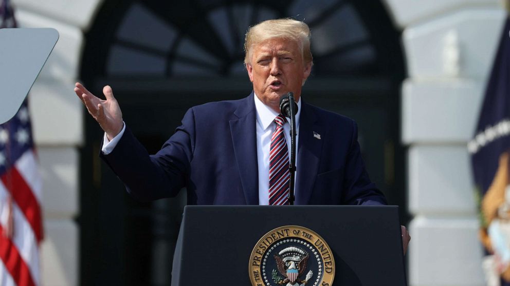 PHOTO: President Donald Trump touts administration efforts to curb federal regulations during an event on the South Lawn of the White House in Washington, July 16, 2020. 