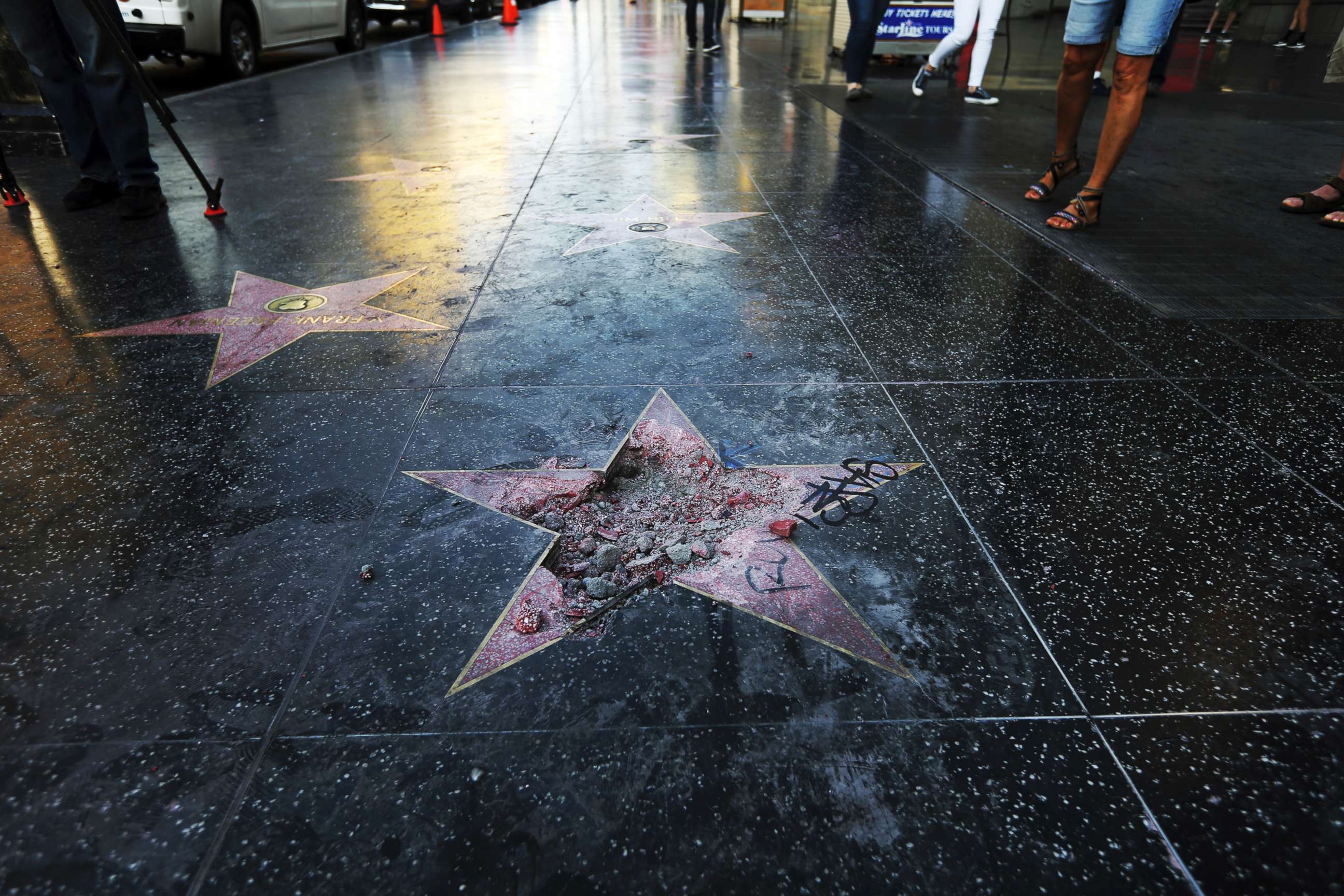 PHOTO: The damage done to Donald Trump's star on the Hollywood Walk of Fame that was vandalized, July 25, 2018, in Los Angeles. Authorities said a pickax was used in the vandalism.