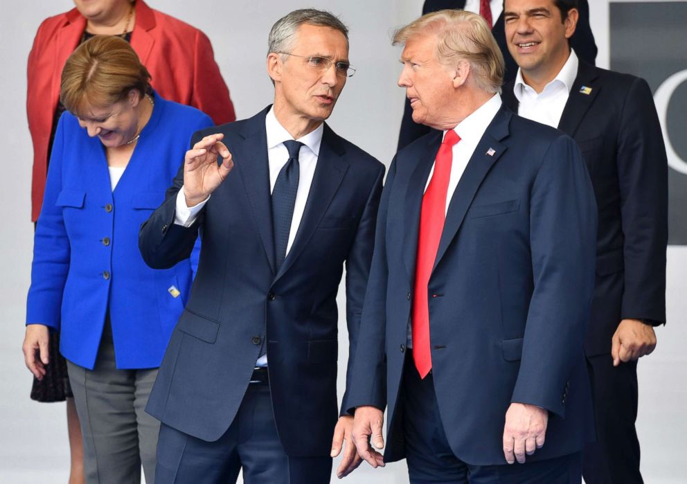 PHOTO: German Chancellor Angela Merkel, NATO Secretary-General Jens Stoltenberg and President Donald Trump attend a family photo during a summit of heads of state and government at NATO headquarters in Brussels on July 11, 2018.