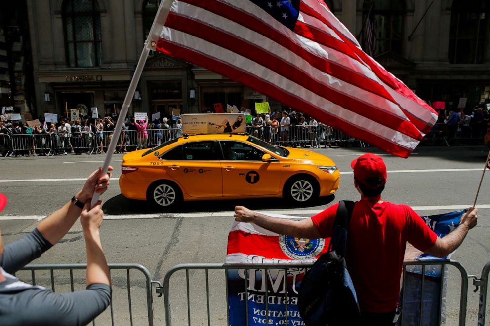 PHOTO: Trump supporters, front, confront  activists during the '100 Days of Failure' protest in New York, April 29, 2017.