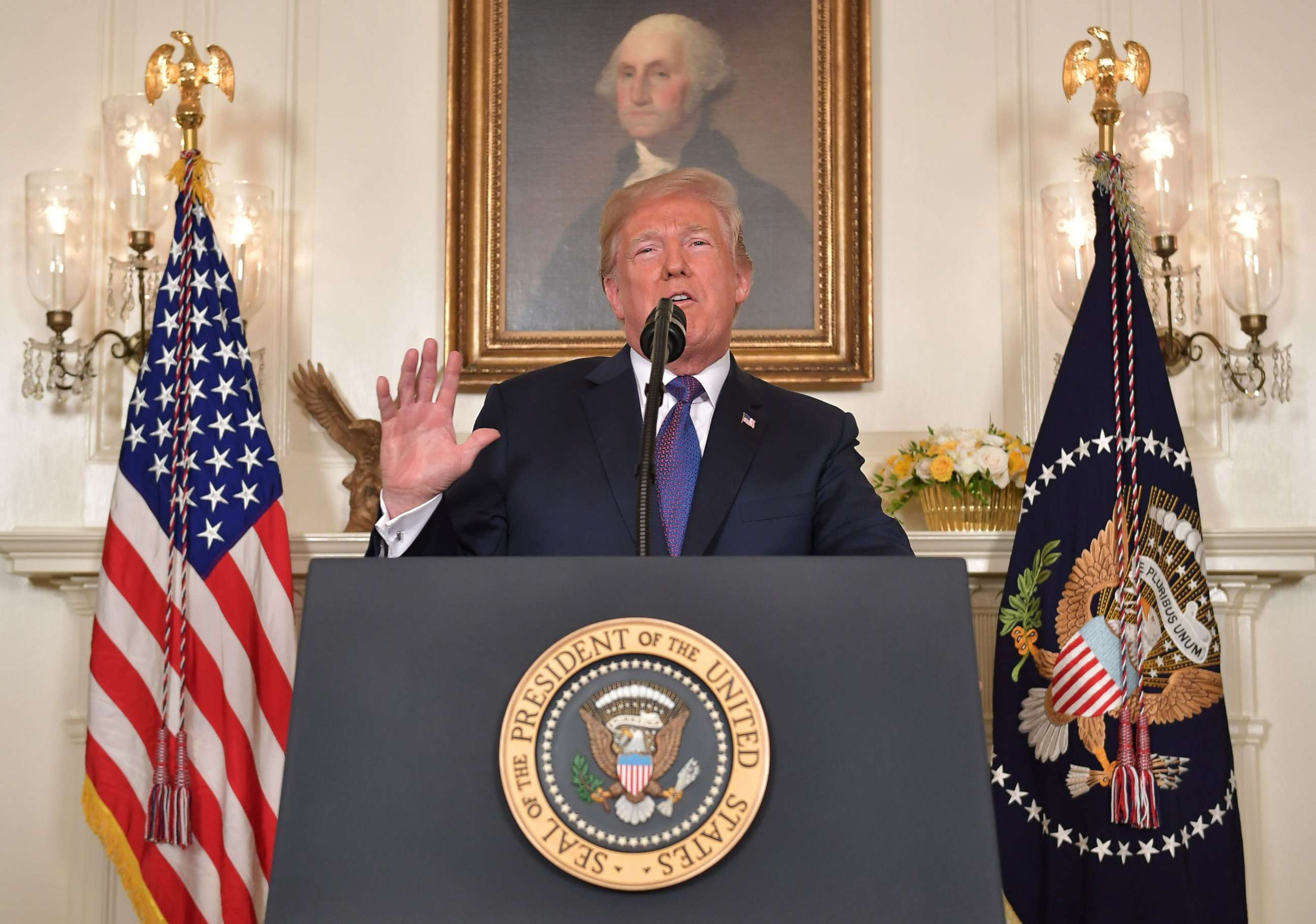 PHOTO: President Donald Trump addresses the nation on the situation in Syria April 13, 2018 at the White House in Washington. Trump said strikes on Syria are under way.