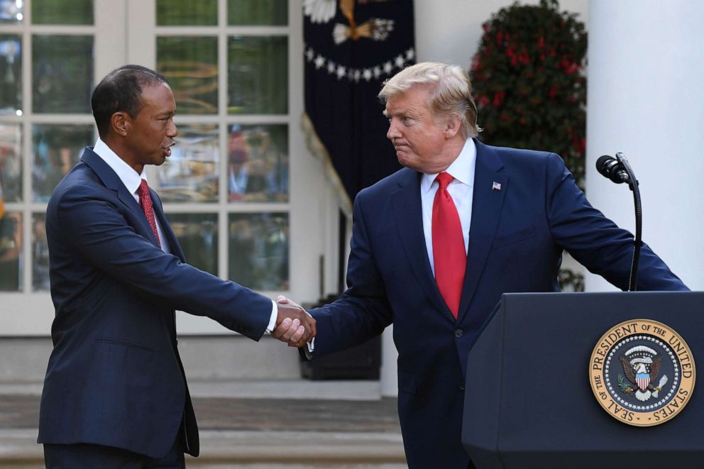 PHOTO: President Donald Trump shakes hands with golfer Tiger Woods during an event to present him with the Presidential Medal of Freedom in the Rose Garden of the White House in Washington, May 6, 2019.