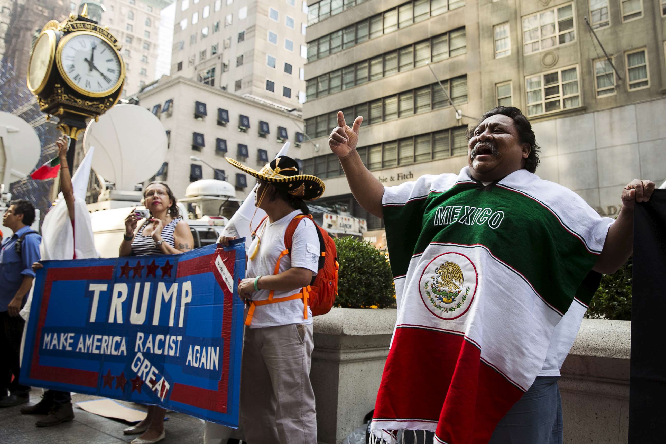 PHOTO: In this Sept. 3, 2015, file photo, demonstrators stand outside of Trump Tower in New York to protest Donald Trump's candidacy for U.S. President.