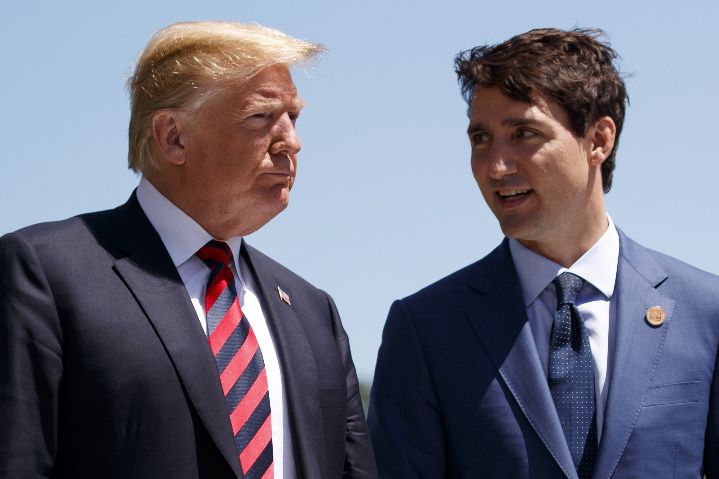PHOTO: President Donald Trump talks with Canadian Prime Minister Justin Trudeau during a G-7 Summit welcome ceremony in Charlevoix, Canada, June 8, 2018.