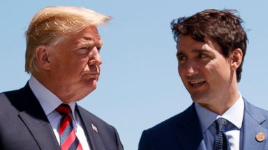 PHOTO: President Donald Trump talks with Canadian Prime Minister Justin Trudeau during a G-7 Summit welcome ceremony in Charlevoix, Canada, June 8, 2018.