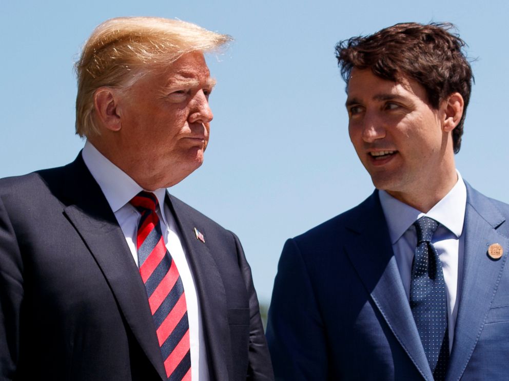 PHOTO: President Donald Trump talks with Canadian Prime Minister Justin Trudeau during a G-7 Summit welcome ceremony in Charlevoix, Canada, June 8, 2018.