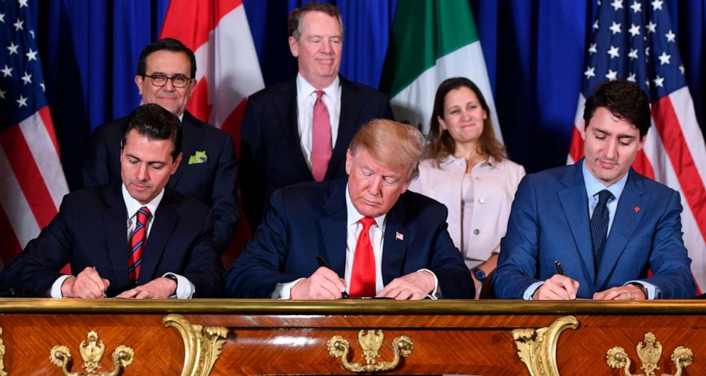 PHOTO: Mexico's President Enrique Pena Nieto, left, President Donald Trump, center, and Canadian Prime Minister Justin Trudeau, sign a new free trade agreement in Buenos Aires on Nov, 30, 2018, on the sidelines of the G20 Leaders' Summit.