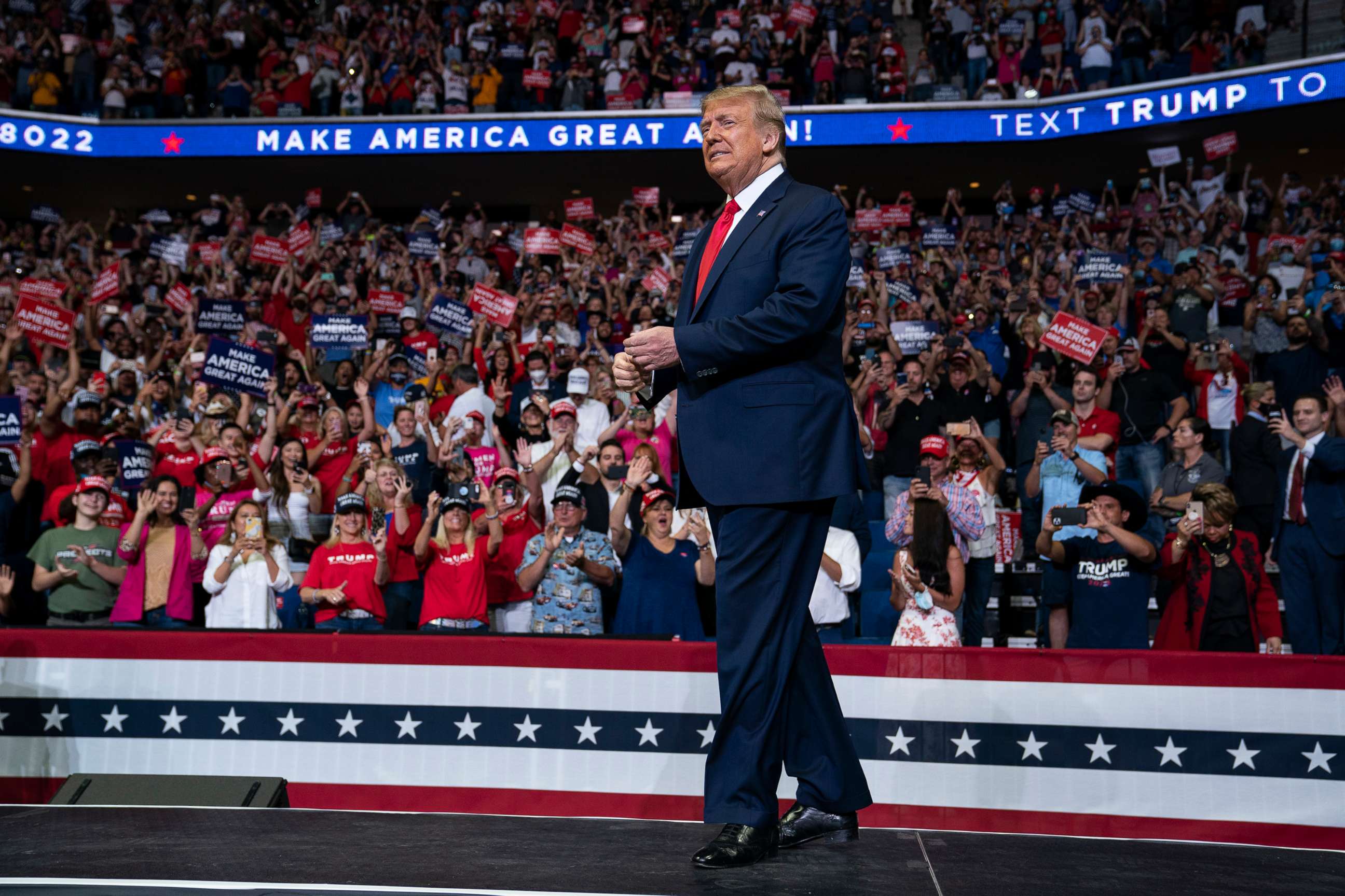 PHOTO: In this June 20, 2020, file photo, President Donald Trump arrives on stage to speak at a campaign rally at the BOK Center in Tulsa, Okla.