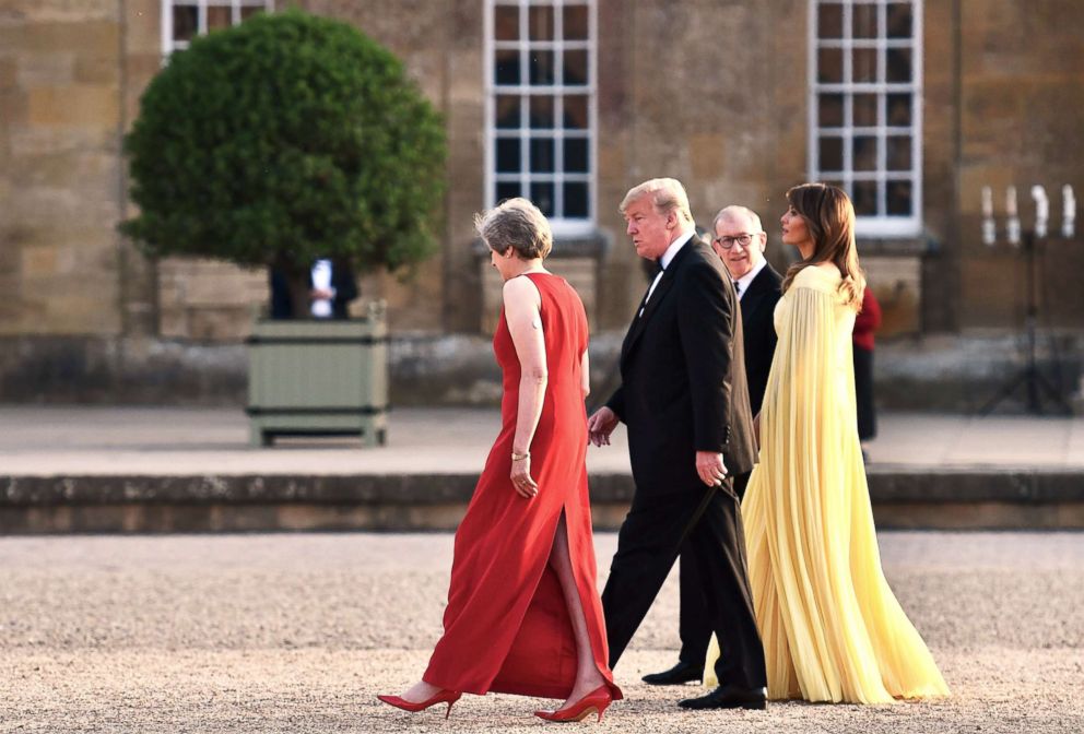 PHOTO: Britain's Prime Minister Theresa May (L) and her husband Philip May (2R) walk with President Donald Trump and First Lady Melania Trump as the president and the first lady arrive for a dinner at Blenheim Palace, west of London, July 12, 2018.