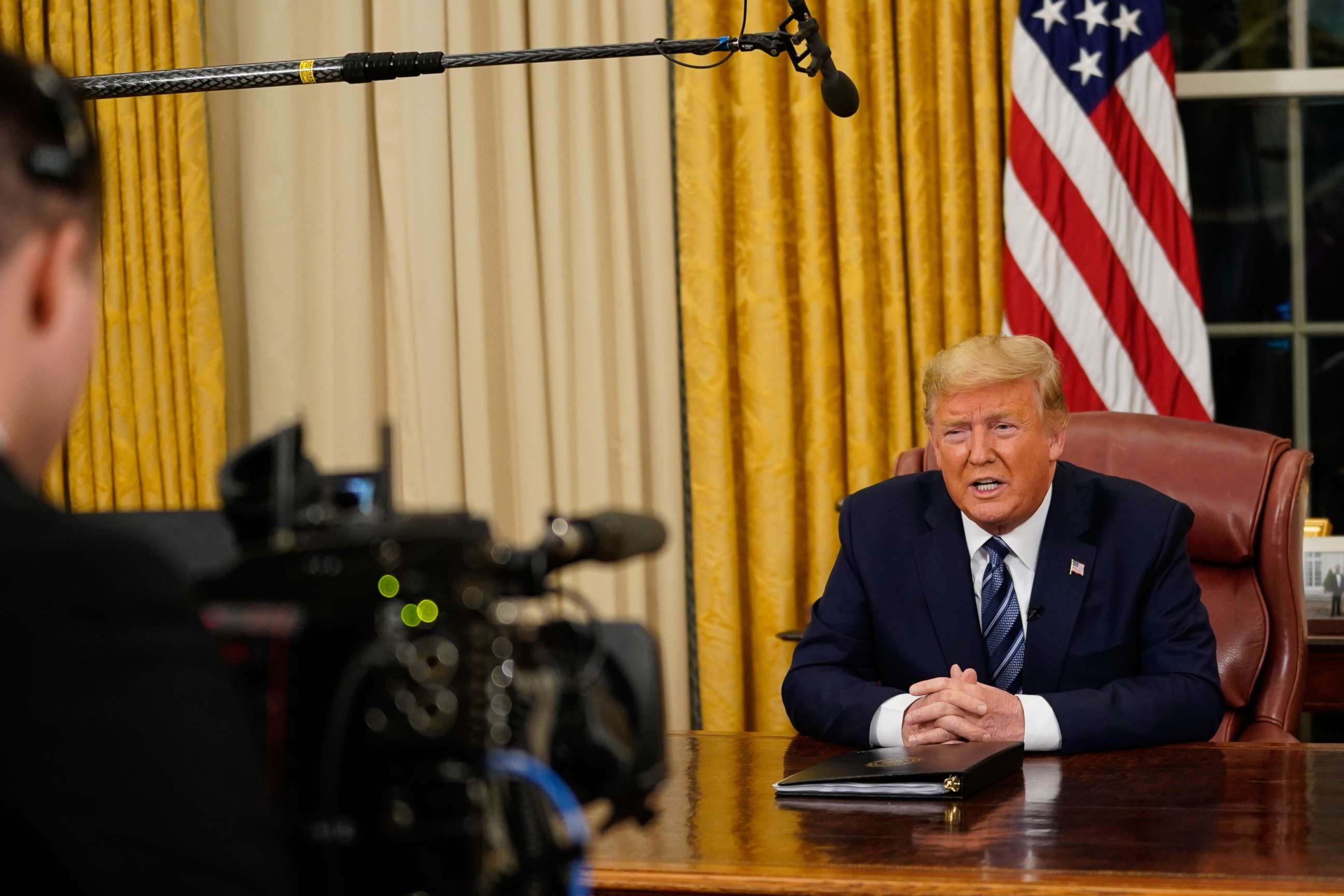 PHOTO: President Donald Trump speaks in an address to the nation from the Oval Office at the White House about the coronavirus Wednesday, March, 11, 2020, in Washington.