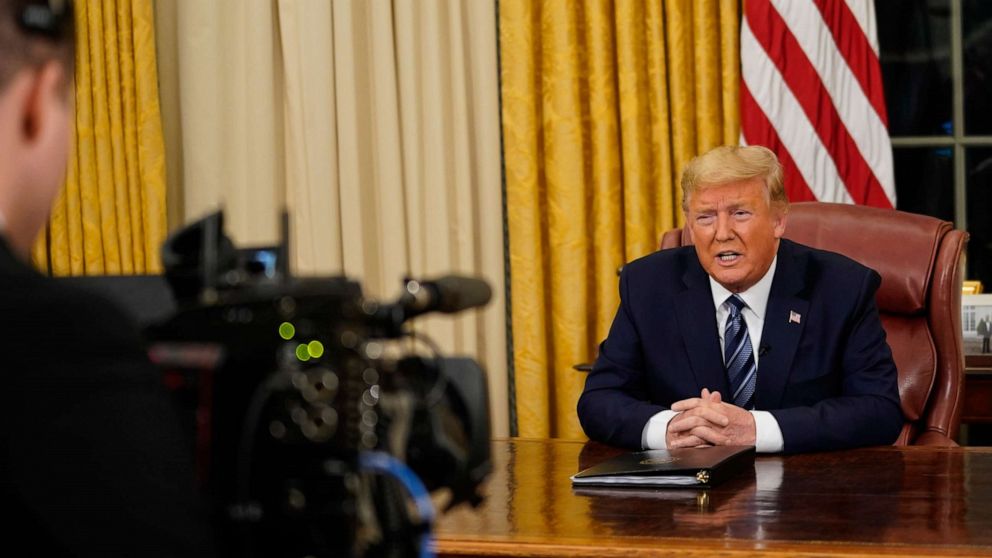 PHOTO: President Donald Trump speaks in an address to the nation from the Oval Office at the White House about the coronavirus Wednesday, March, 11, 2020, in Washington.