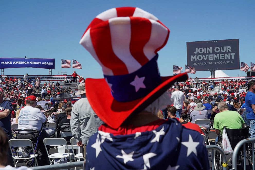 PHOTO: A supporter of former U.S. President Donald Trump wears a hat during his first campaign rally after announcing his candidacy for president in the 2024 election at an event in Waco, Texas, Mar. 25, 2023.