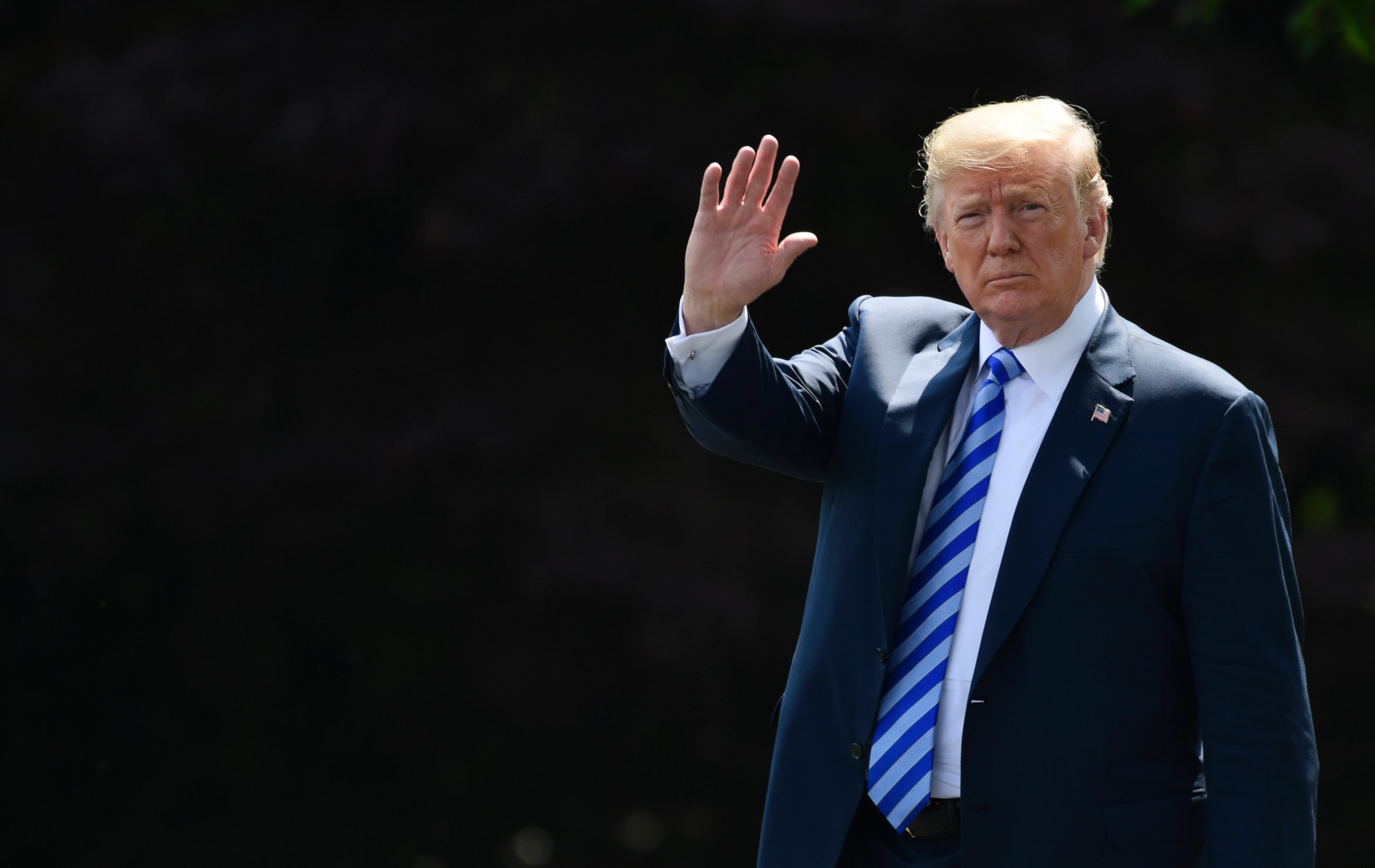 PHOTO: President Donald Trump walks from the Oval Office to Marine One on the South Lawn of the White House in Washington, Friday, June 1, 2018, as he heads to Camp David for the weekend.