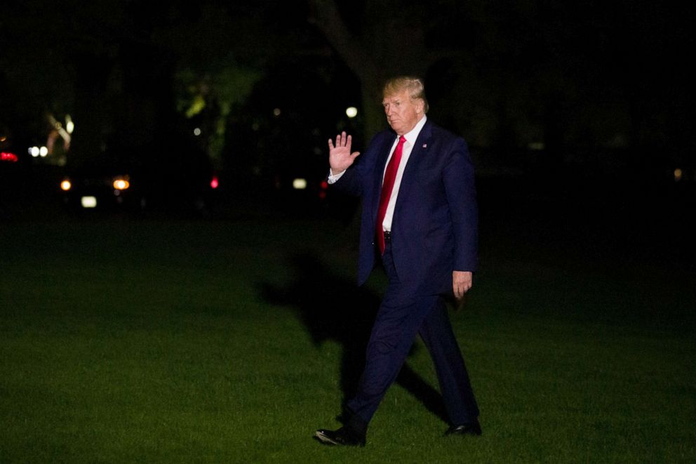 PHOTO: President Donald Trump waves after stepping off Marine One on the South Lawn of the White House, early Friday, Oct. 18, 2019, in Washington, D.C.returning from a campaign rally in Texas. (AP Photo/Alex Brandon)
