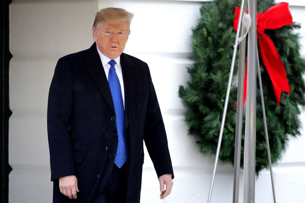 PHOTO: President Donald Trump walks out of White House, Dec. 02, 2019, in Washington.
