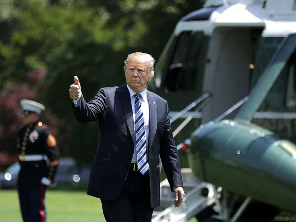 PHOTO: President Donald Trump gives a thumbs up as he walks across the South Lawn after returning to the White House on May 25, 2018, in Washington, D.C. Trump delivered remarks at the U.S. Naval Academy graduation ceremony in Annapolis, Maryland.