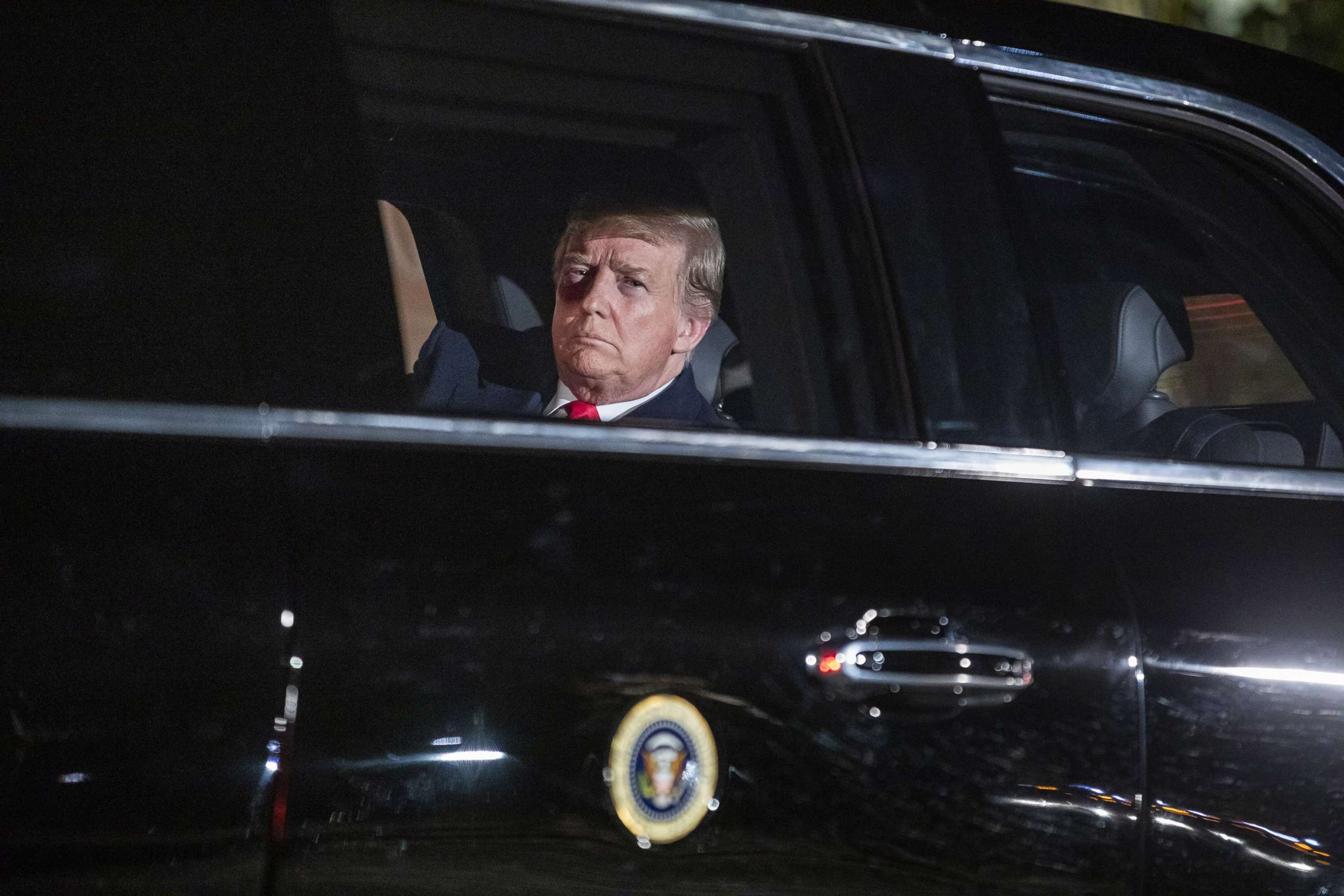 PHOTO: President Donald Trump sits in the presidential limo as he departs the White House for Capitol Hill, where he will deliver his second State of the Union speech, on Feb. 5, 2019 in Washington, D.C.