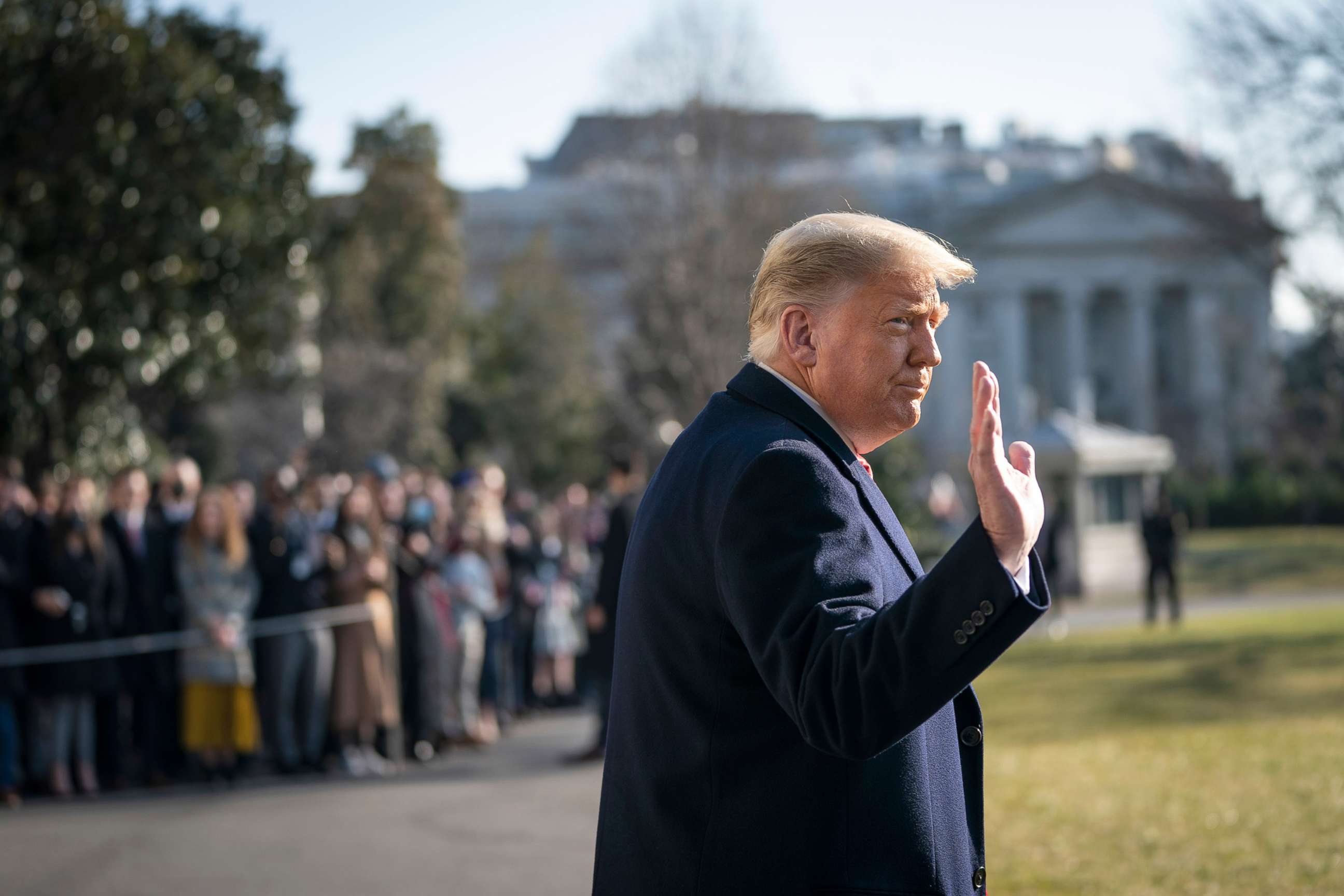 PHOTO: President Donald Trump waves as he walks to Marine One on the South Lawn of the White House on Jan. 12, 2021 in Washington, D.C. 
