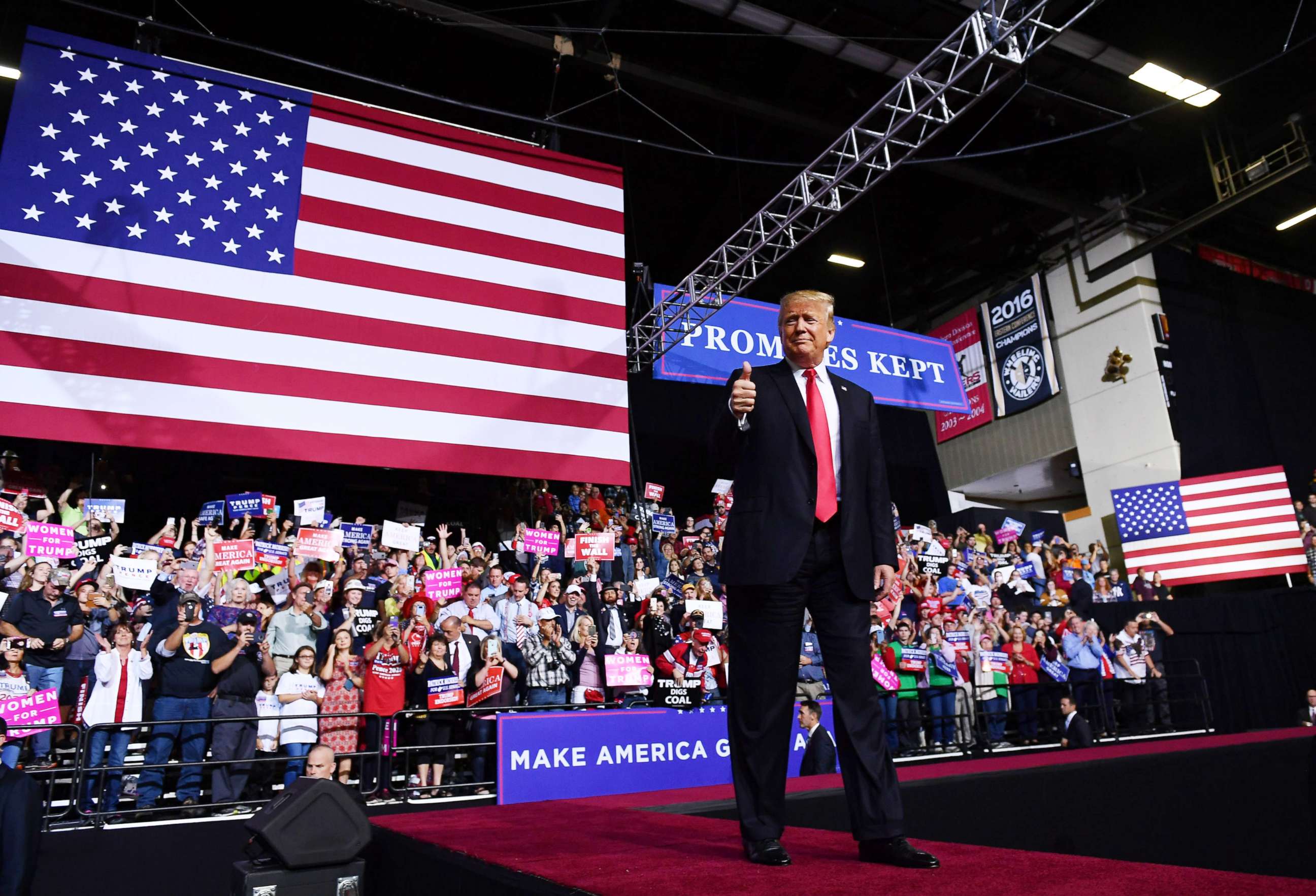 PHOTO: President Donald Trump gives a thumbs up during a rally at WesBanco Arena in Wheeling, West Virginia on September 29, 2018.