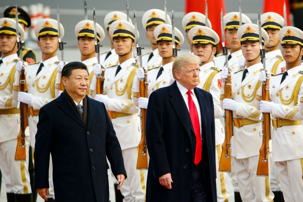 PHOTO: U.S. President Donald Trump takes part in a welcoming ceremony with China's President Xi Jinping on November 9, 2017 in Beijing, China.