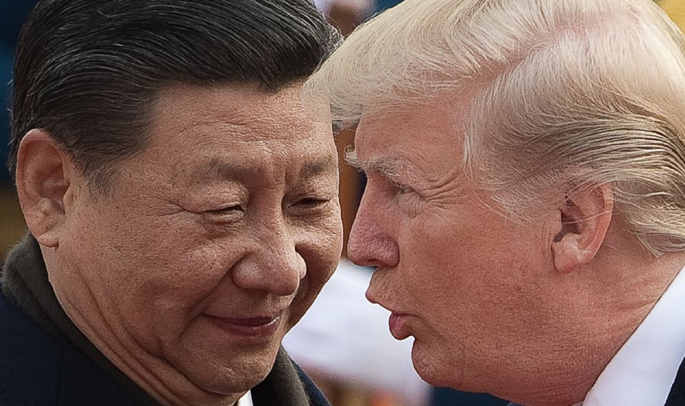 PHOTO: China's President Xi Jinping and President Donald Trump attend a welcome ceremony at the Great Hall of the People in Beijing on Nov. 9, 2017.