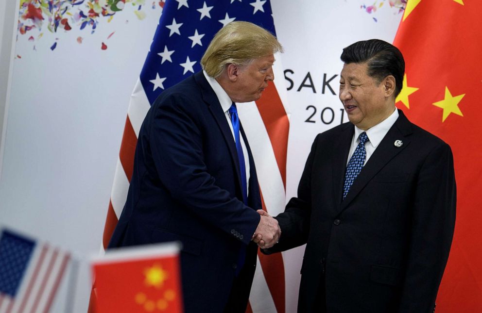 PHOTO: China's President Xi Jinping (R) greets US President Donald Trump before a bilateral meeting on the sidelines of the G20 Summit in Osaka on June 29, 2019.