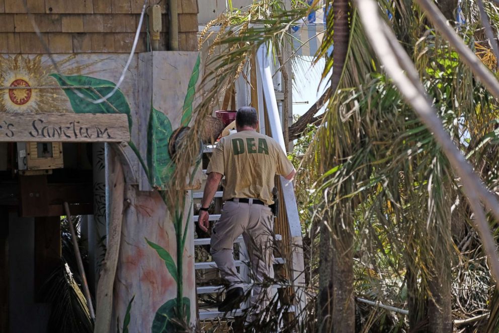 PHOTO: A DEA special agent checks a house for stranded victims on Cudjoe Key, Fla., Sept. 13, 2017, after Hurricane Irma passed through the area. The Florida Keys still lacks water, electricity or mobile phone service.