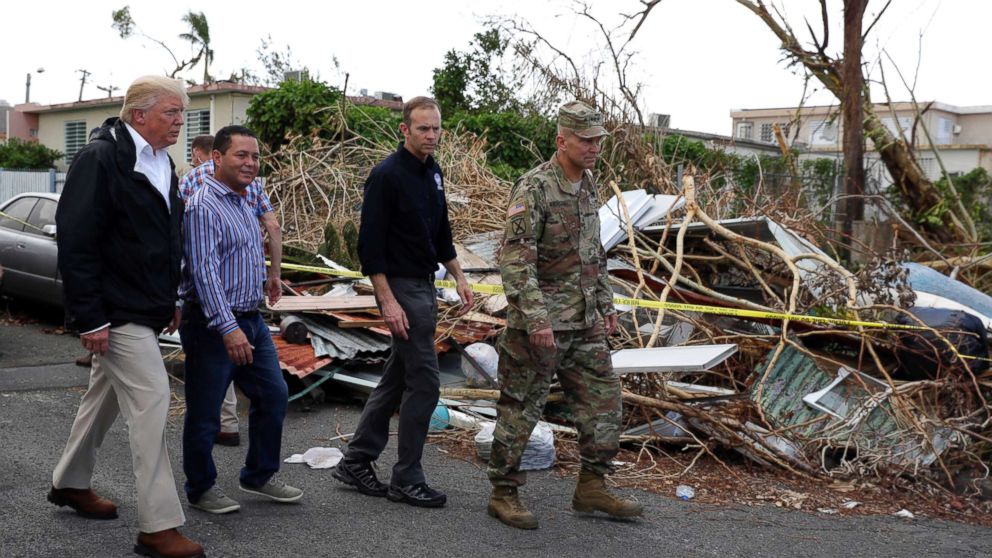 PHOTO: FEMA administrator Brock Long, second from right, with President Donald Trump and Lt. Gen. Jeff Buchanan, right as they toured an area affected by Hurricane Maria in Guaynabo, Puerto Rico, Oct. 3, 2017.