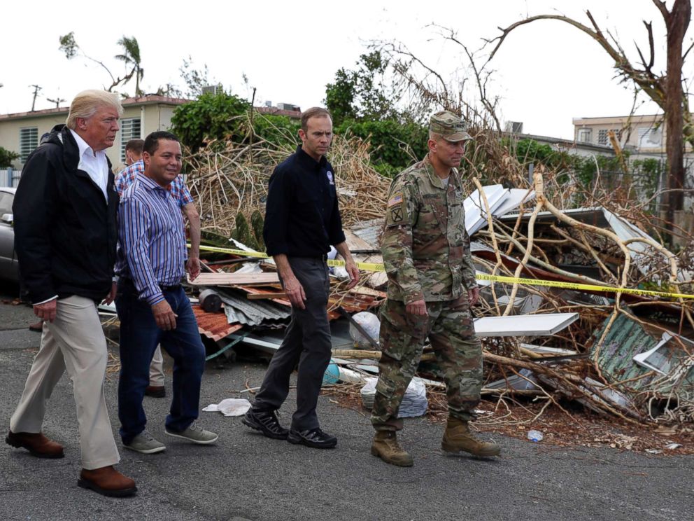 PHOTO: FEMA administrator Brock Long, second from right, with President Donald Trump and Lt. Gen. Jeff Buchanan, right as they toured an area affected by Hurricane Maria in Guaynabo, Puerto Rico, Oct. 3, 2017.