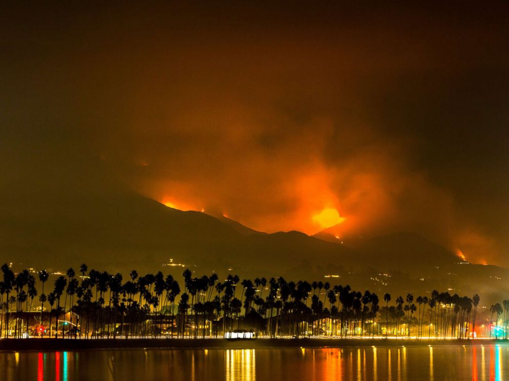 PHOTO: Fire, smoke, and ash from the Thomas Fire, shown burning in the hills above Montecito, Summerland, and Carpinteria along the eastern edges of the county, Dec. 13, 2017, in Santa Barbara, Calif.