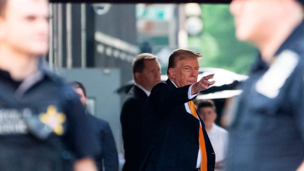 PHOTO: Former president Donald Trump waves while leaving Trump Tower on his way to Manhattan criminal court, May 21, 2024, in New York.