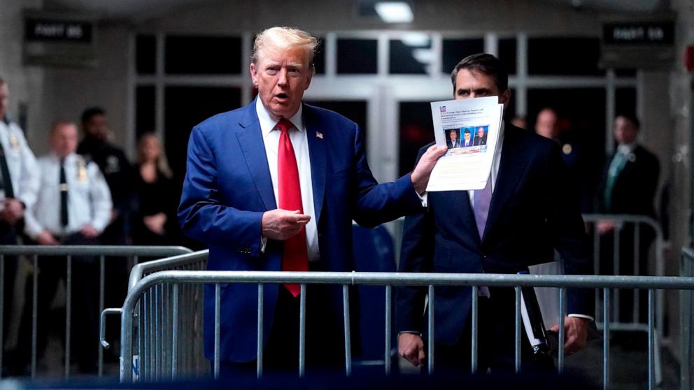 PHOTO: Former President Donald Trump, with attorney Todd Blanche (R), speaks to the press as he arrives for his trial at Manhattan Criminal Court in New York City, on May 10, 2024.