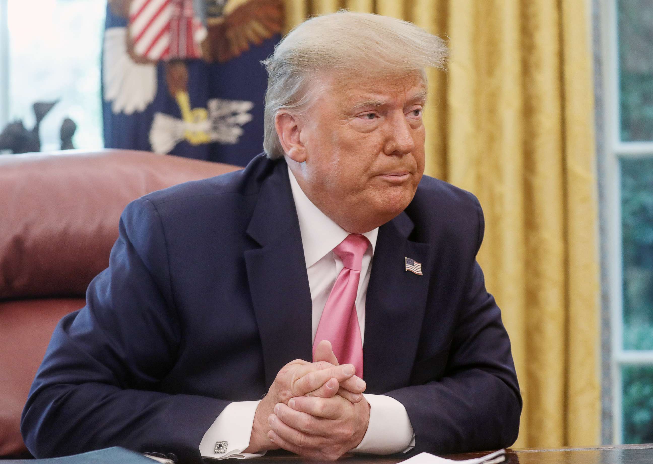 PHOTO: President Donald Trump speaks about legislation for additional coronavirus aid in the Oval Office at the White House in Washington, July 20, 2020.