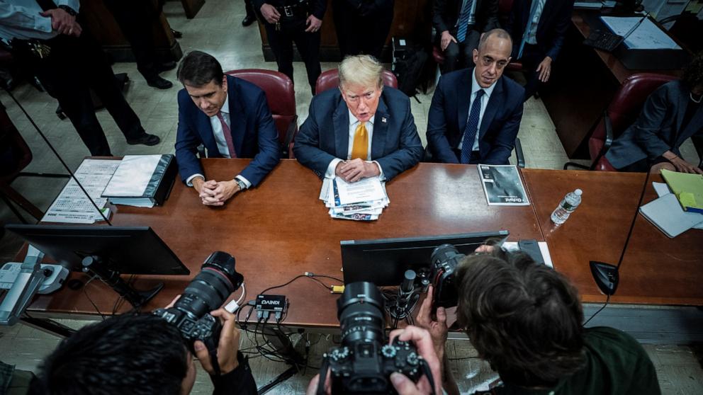 PHOTO: Former President Donald Trump, flanked by attorneys Todd Blanche and Emil Bove, arrives for his criminal trial at the Manhattan Criminal Court in New York, NY on  May 29, 2024.
