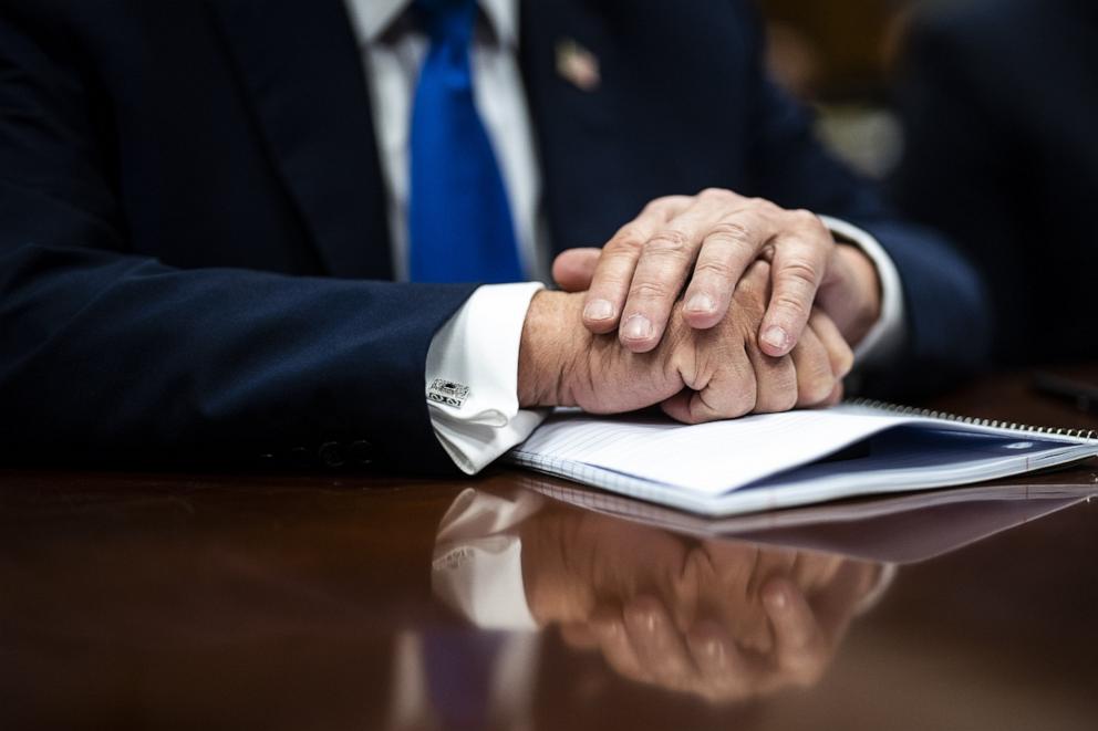 PHOTO: Former President Donald Trump folds his hands as he arrives at Manhattan Criminal Court in New York City, April 18, 2024.