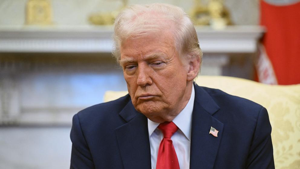 PHOTO: President Donald Trump listens as he meets with Ukraine's President Volodymyr Zelenskyy in the Oval Office of the White House in Washington, DC, Feb. 28, 2025.