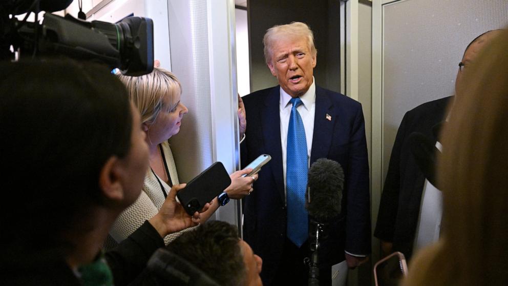 PHOTO: President Donald Trump speaks with journalist on board Air Force One on route from Miami, Fla., to the White House in Washington, DC on Feb. 19, 2025.