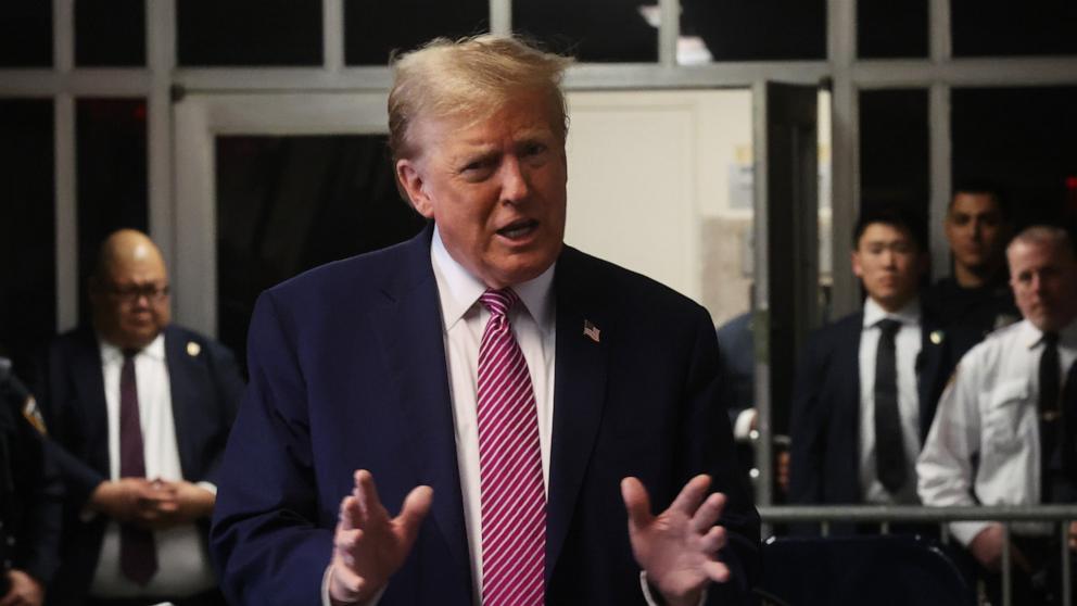 PHOTO: Former President Donald Trump speaks to the media as he enters Manhattan Criminal Court for his trial on April 19, 2024 in New York City.
